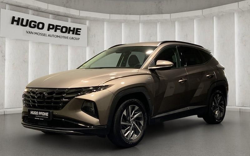 Braun Gebraucht 2021 Hyundai Tucson Trend SUV | 24.290 € (Fairer Preis) - Bild 1/4
