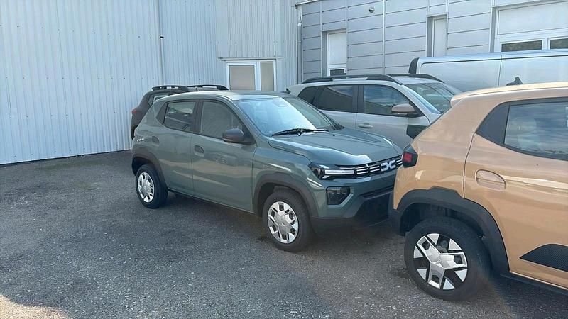 Grün Neu 2025 Dacia Spring Essentiel Kleinwagen | 12.499 € (Superpreis) - Bild 1/2