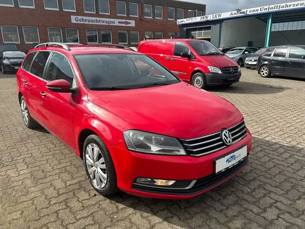 Second-hand VW Passat Trendline 140 CP (102 kW) 2012 Roșu Break