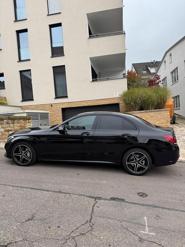 Schwarz Gebraucht 2014 Mercedes C220 AMG line Limousine | 16.900 € - Bild 1/4