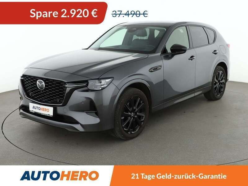 Grau Gebraucht 2023 Mazda CX-60 Homura-Line SUV | 34.570 € - Bild 1/3