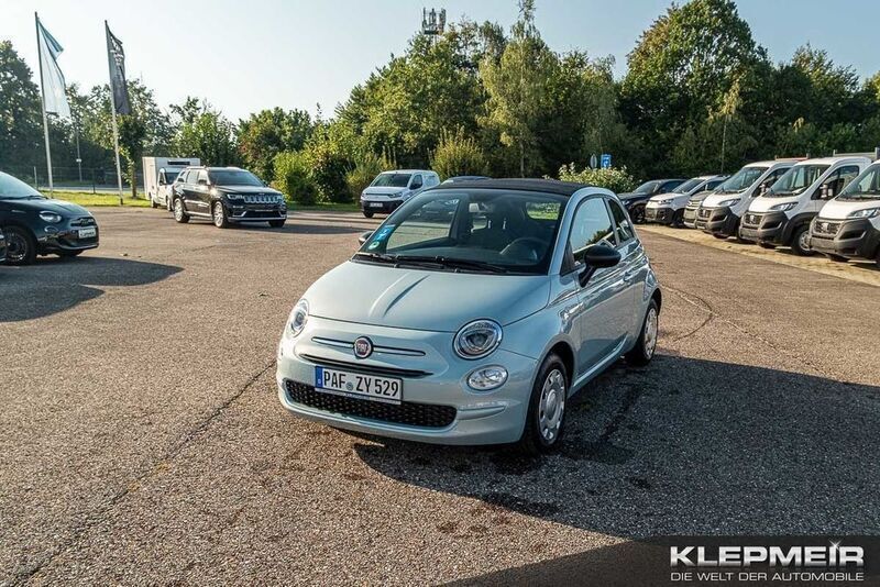Tau grün Gebraucht 2023 Fiat 500 Dolcevita Cabrio | 15.990 € (Teuer) - Bild 1/4