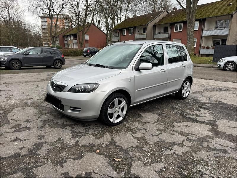 Silber Gebraucht 2006 Mazda 2 Kleinwagen | 2.900 € (Fairer Preis) - Bild 1/4