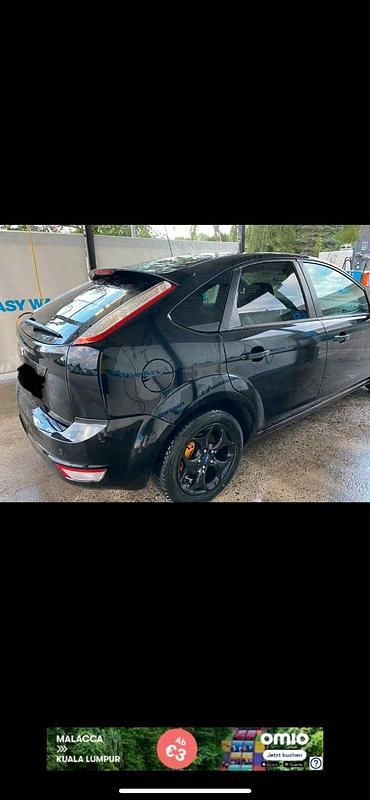 Gebraucht Ford Focus 105 PS (77 kW) 2010 Schwarz Limousine