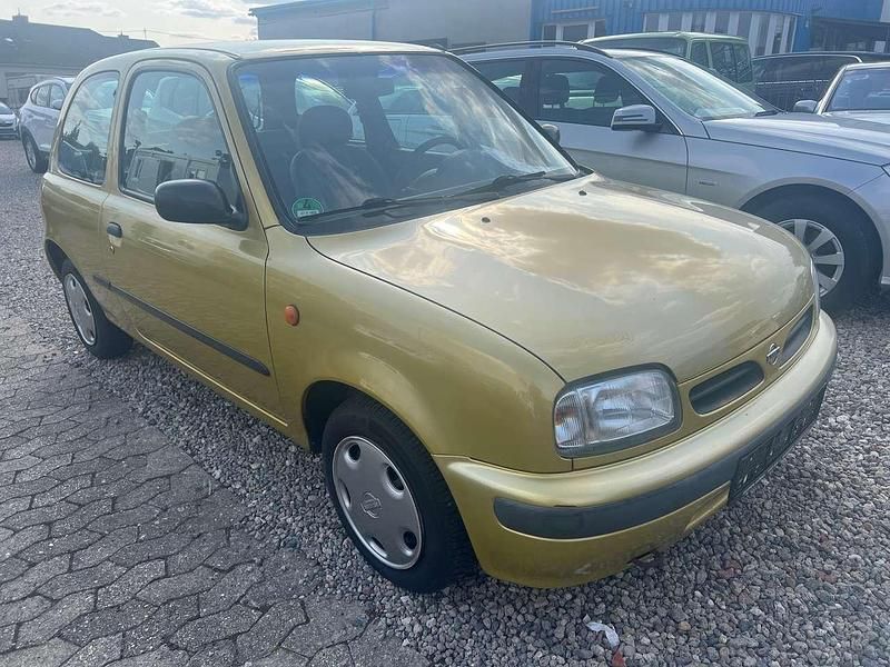Gold Gebraucht 1996 Nissan Micra Kleinwagen | 2.599 € - Bild 1/4