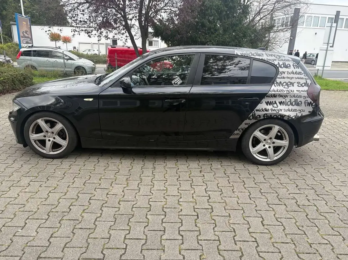 Second-hand BMW 116 116 CP (85 kW) 2004 Negru Hatchback