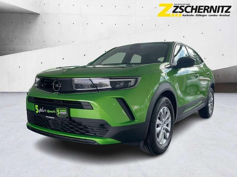 Matcha green/ikone gruen Gebraucht 2022 Opel Mokka Edition SUV | 14.960 € (Guter Preis) - Bild 1/4