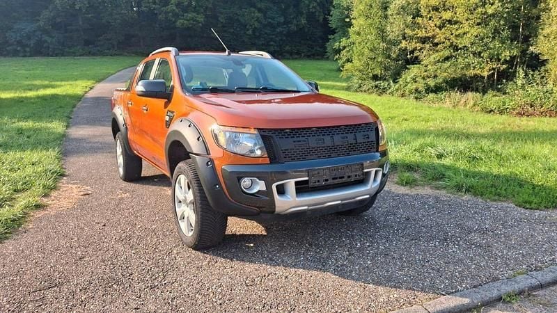 Orange Gebraucht 2015 Ford Ranger Wildtrack Abholung | 19.399 € (Fairer Preis) - Bild 1/4