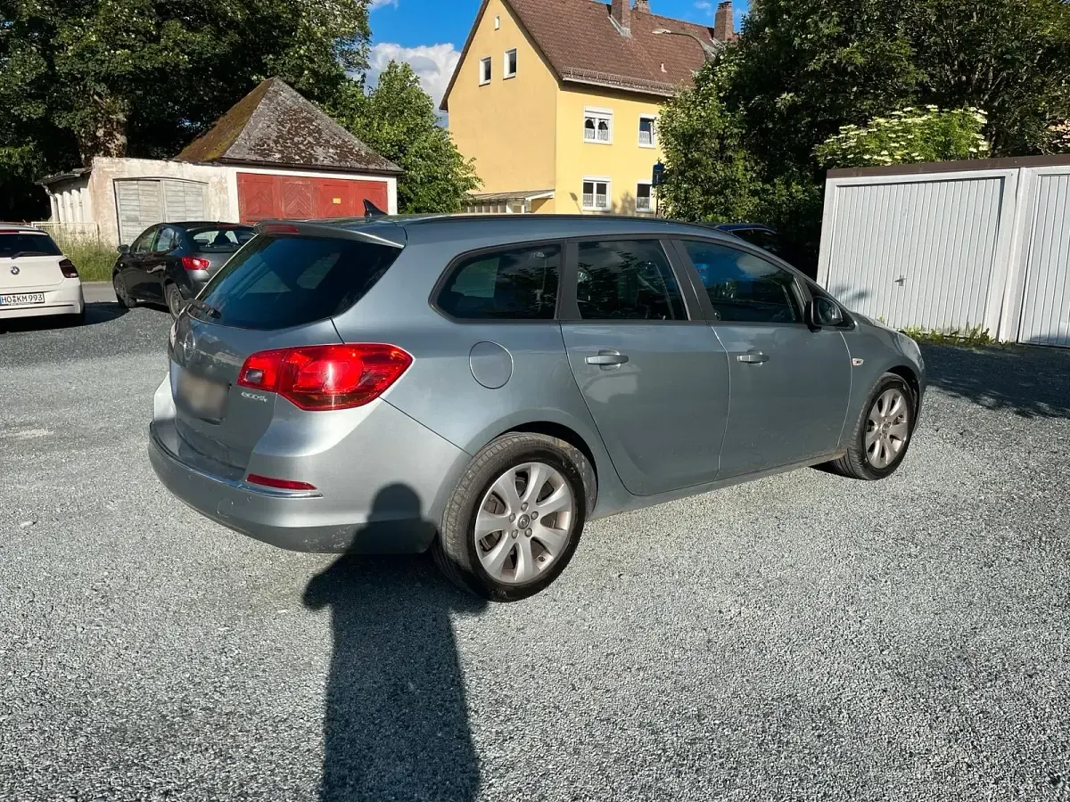 Gebraucht Opel Astra 110 PS (80 kW) 2013 Grau Kombi