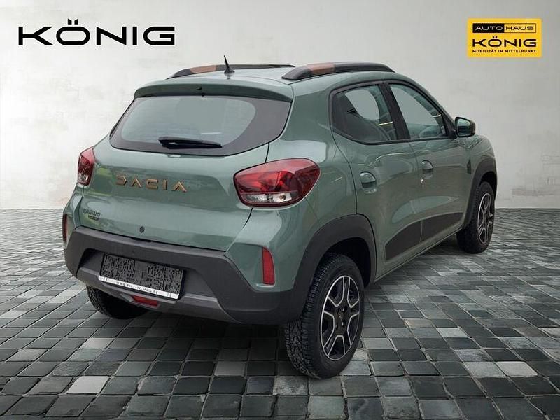 Gebraucht Dacia Spring Extreme 47 kW (65 PS) 2023 Olivgrün Kleinwagen