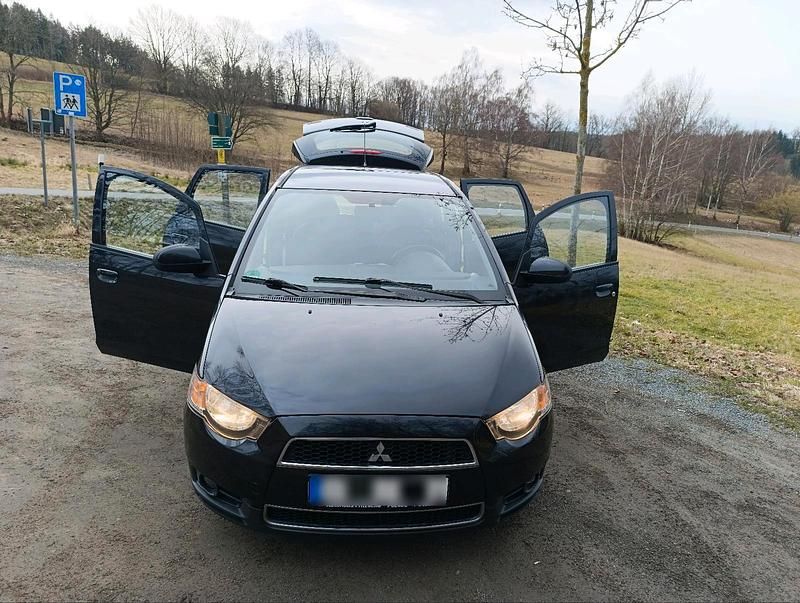 Gebraucht Mitsubishi Colt 95 PS (69 kW) 2011 Schwarz Kleinwagen