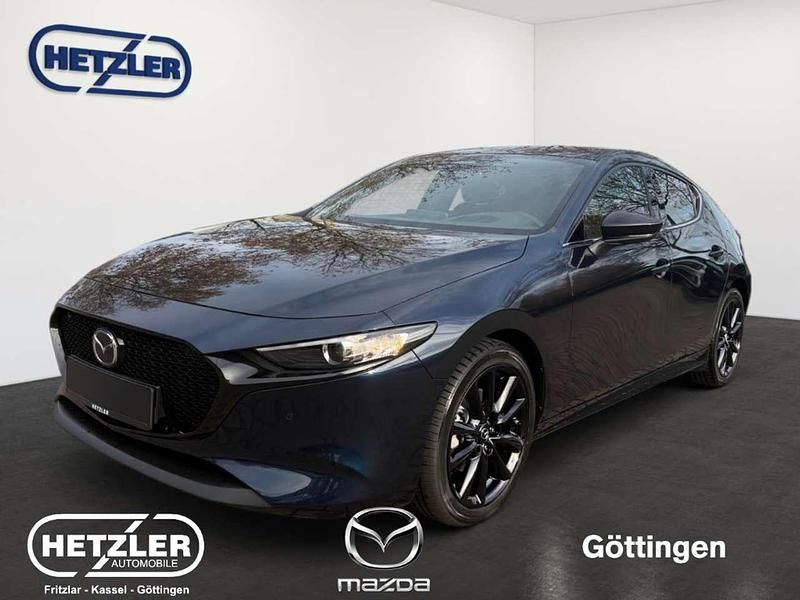 Deep crystal blue Neu 2025 Mazda 3 Homura-Line Limousine | 27.900 € - Bild 1/4