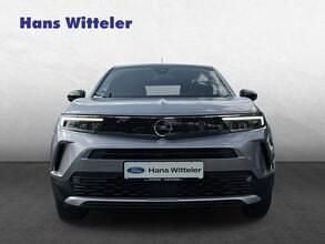 Gebraucht Opel Mokka-e Elegance 100 kW (136 PS) 2022 Kontrast grau/quarz silber SUV