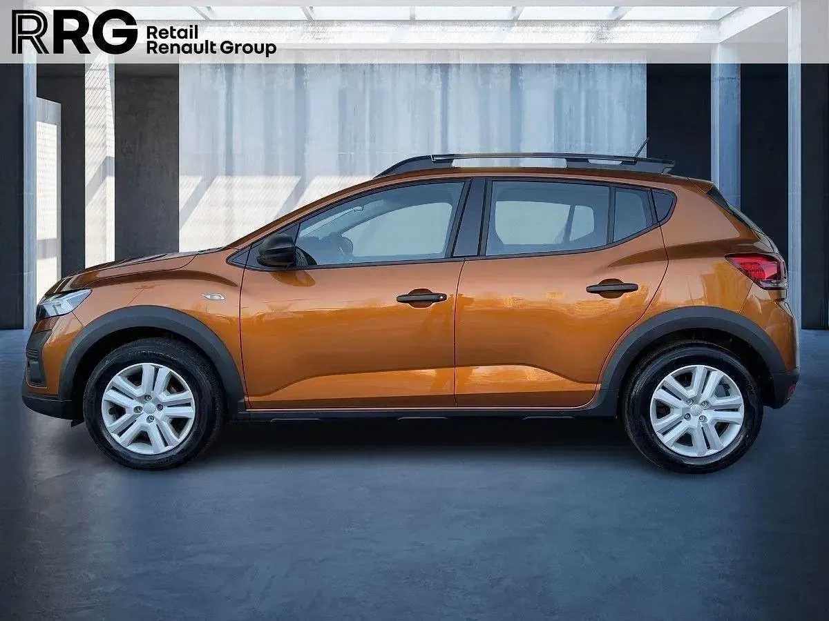 Gebraucht Dacia Sandero Essentiel 101 PS (74 kW) 2024 Atacamaorange (orange) Limousine