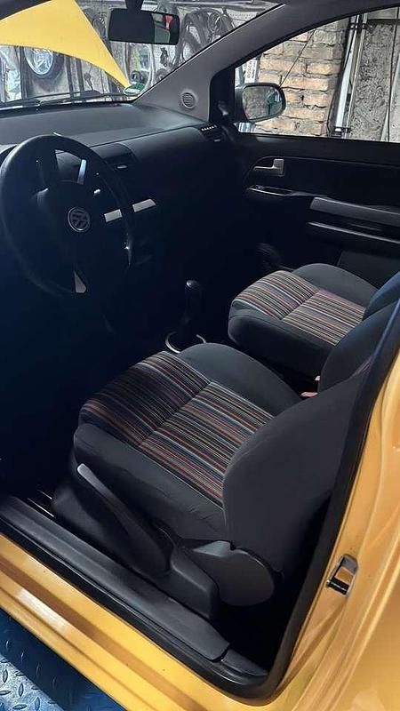 Second-hand VW Fox 54 CP (39 kW) 2006 Galben Hatchback