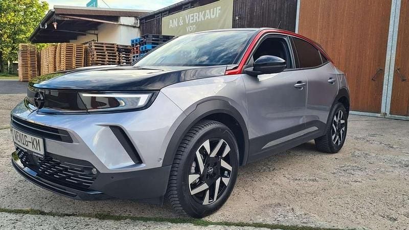 Gebraucht Opel Mokka-e GS Line 100 kW (136 PS) 2023 Artense/ dach &haube schwarz SUV