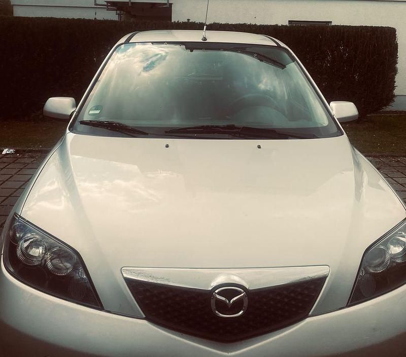 Usado Mazda 2 Impuls 75 HP (55 kW) 2008 Cinzento Citadino