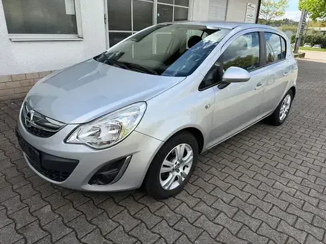 Gebraucht Opel Corsa Active 90 PS (66 kW) 2013 Silber Kleinwagen