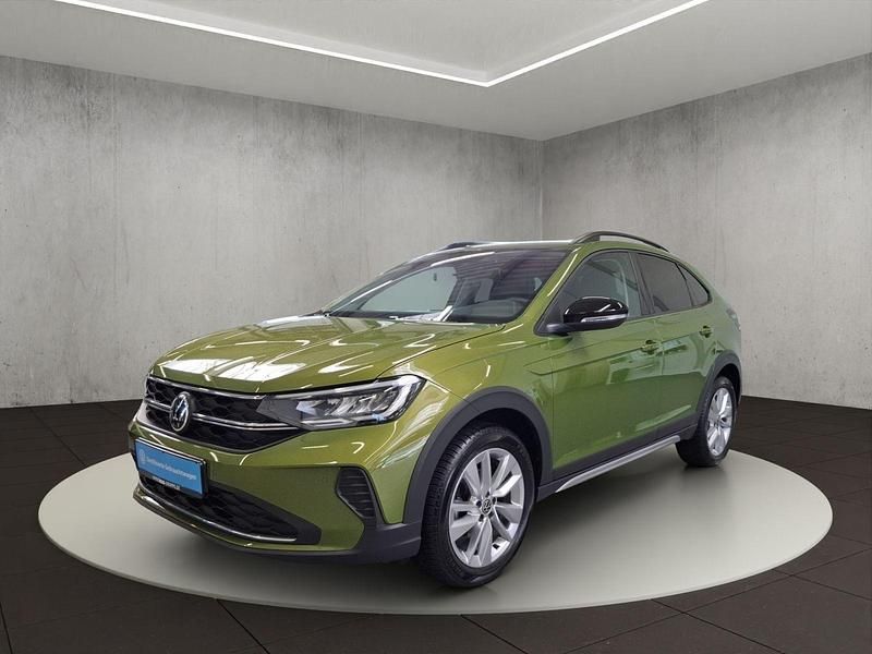 Visual green metallic Gebraucht 2024 VW Taigo Life SUV | 23.400 € (Fairer Preis) - Bild 1/4