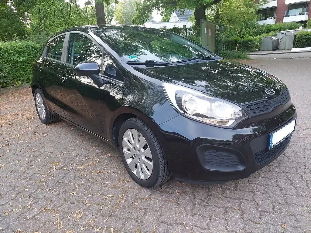 Gebraucht Kia Rio 109 PS (80 kW) 2011 Schwarz Limousine
