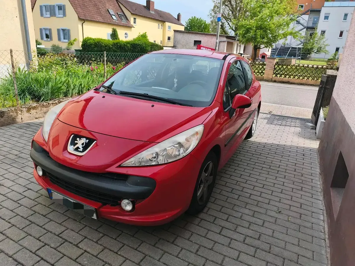Gebraucht Peugeot 207 75 PS (55 kW) 2009 Rot Kleinwagen