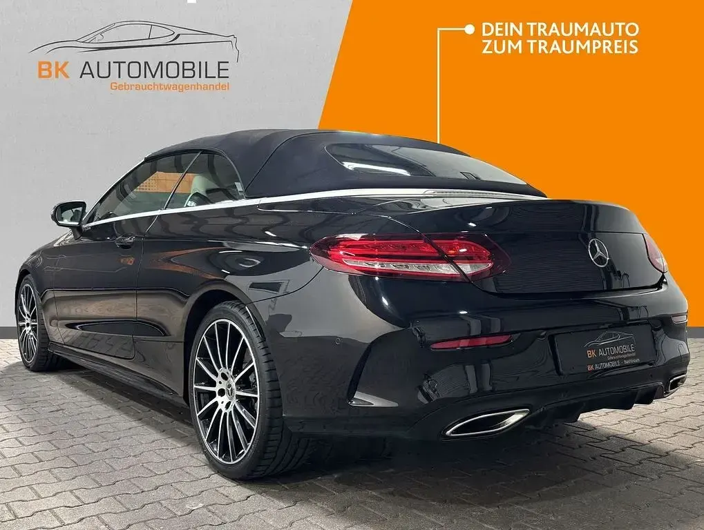 Gebraucht Mercedes C180 AMG 156 PS (114 kW) 2021 Obsidianschwarz Cabrio