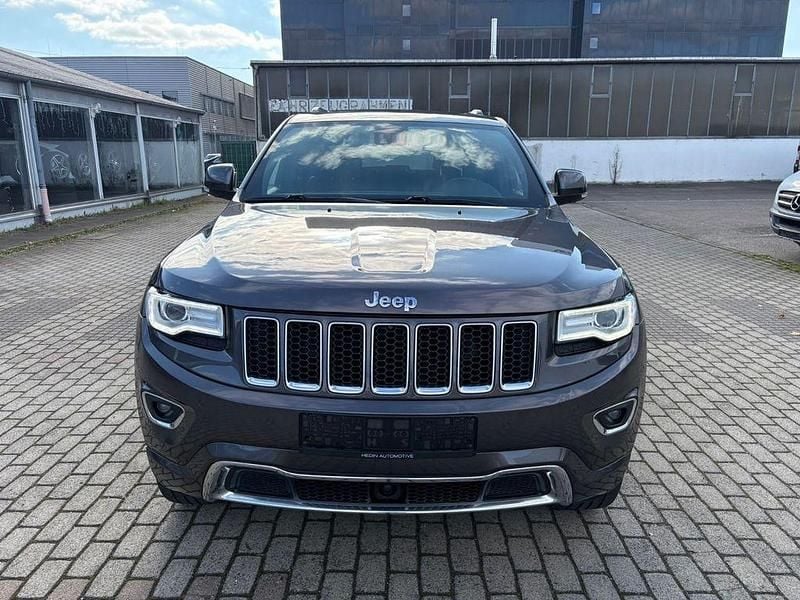 Grau Gebraucht 2015 Jeep Grand Cherokee Overland SUV | 10.999 € - Bild 1/4