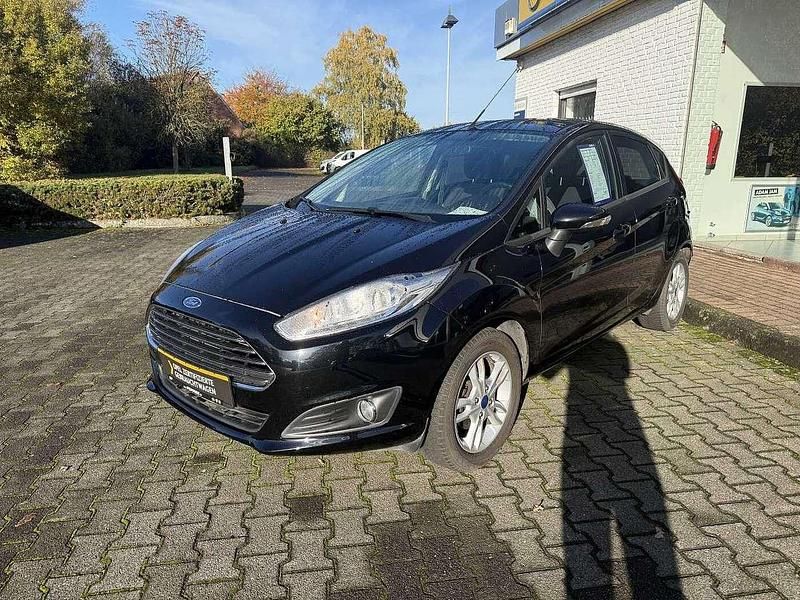 Schwarz Gebraucht 2015 Ford Fiesta Trend Limousine | 7.980 € - Bild 1/4