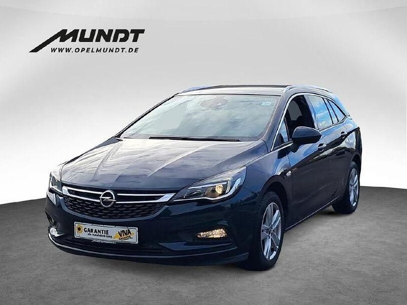 Smaragd gruen (mi) Gebraucht 2019 Opel Astra Dynamic Kombi | 14.470 € (Etwas zu teuer) - Bild 1/4