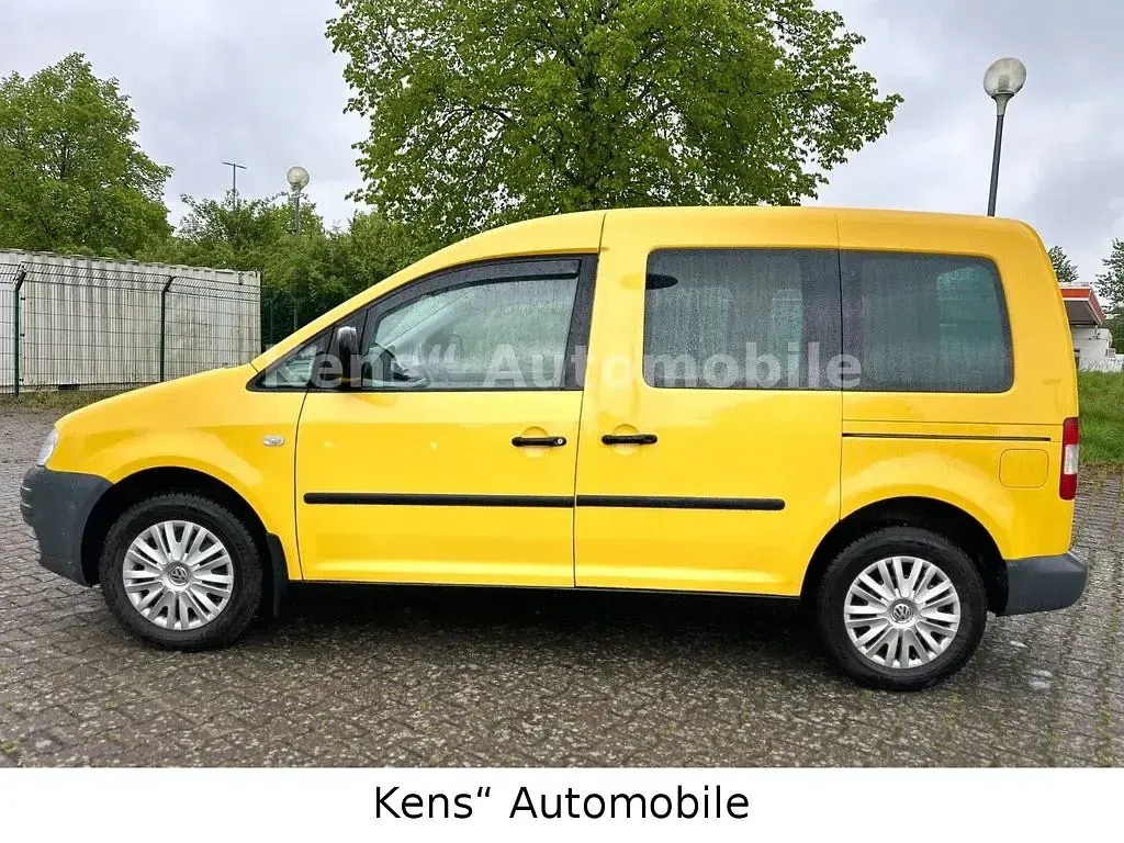 Używany VW Caddy 69 KM (50 kW) 2004 Żółty Minivan
