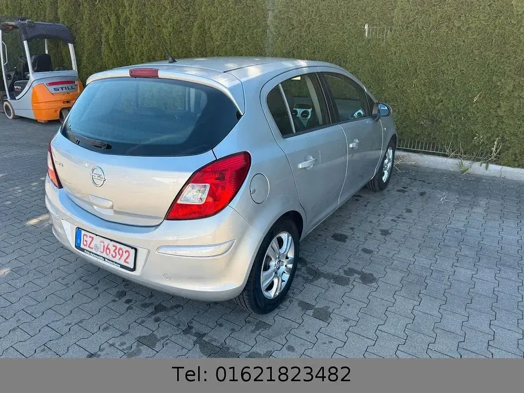 Gebraucht Opel Corsa 86 PS (63 kW) 2012 Silber Kleinwagen
