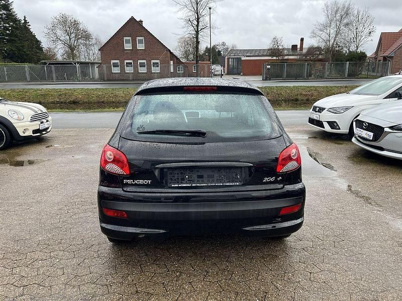 Gebraucht Peugeot 206+ Basis 73 PS (53 kW) 2011 Schwarz Kleinwagen
