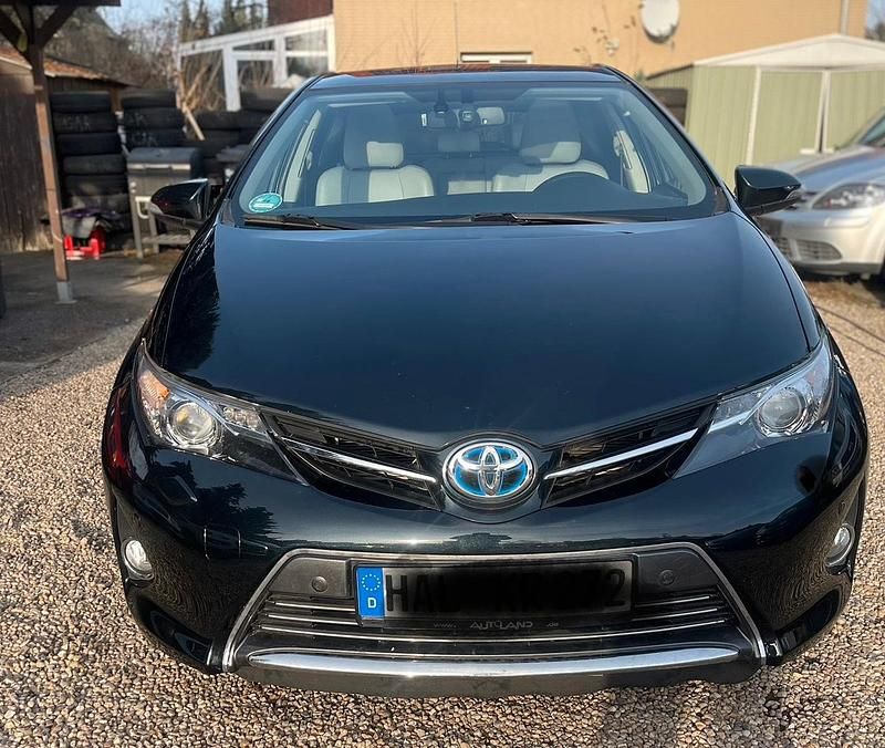 Schwarz Gebraucht 2014 Toyota Auris Hybrid Limousine | 12.499 € (Fairer Preis) - Bild 1/4