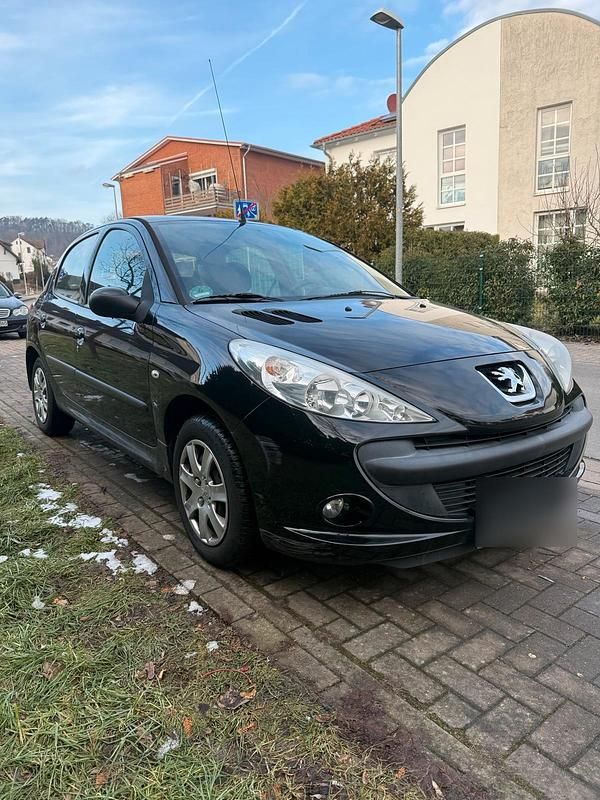 Gebraucht Peugeot 206+ 75 PS (55 kW) 2011 Schwarz Kleinwagen