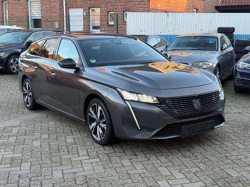 Grau Gebraucht 2022 Peugeot 308 SW Allure Kombi | 14.999 € - Bild 1/4