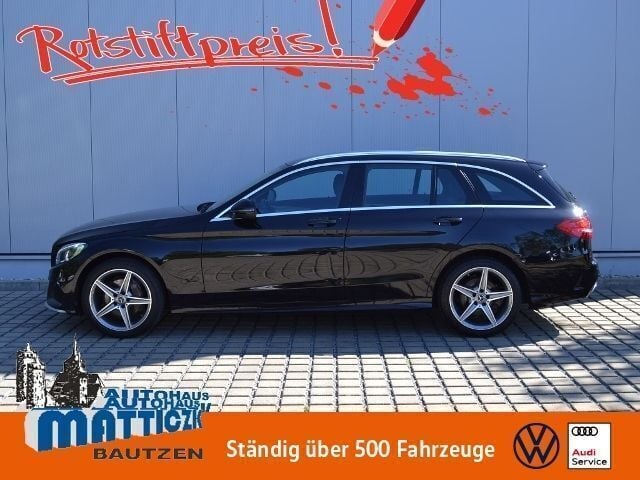 Schwarz (obsidianschwarz metallic) Gebraucht 2017 Mercedes C180 Sport Limousine | 21.859 € (Fairer Preis) - Bild 1/4