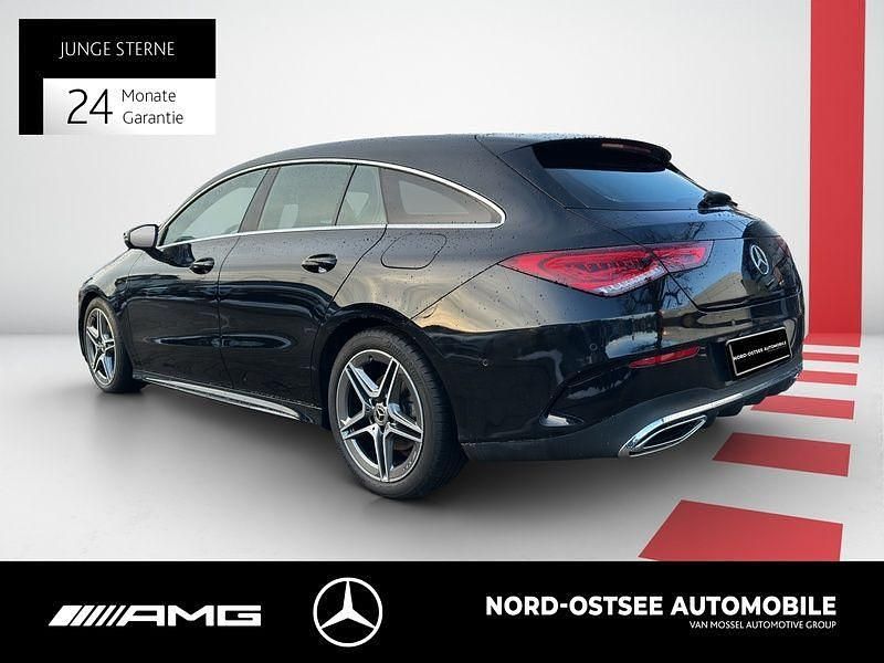 Gebraucht Mercedes CLA200 Shooting Brake AMG 163 PS (119 kW) 2023 Metalliclack kosmosschwarz Kombi