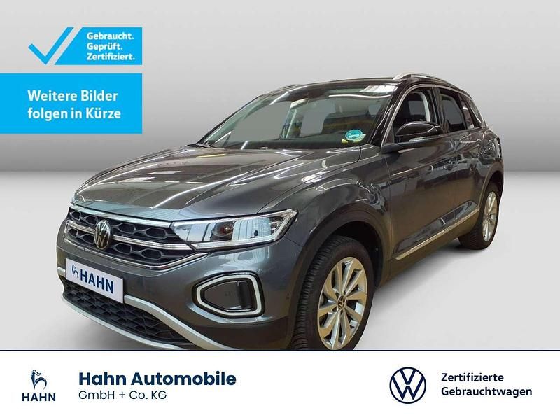 Indiumgrau metallic Gebraucht 2024 VW T-Roc Business SUV | 28.930 € (Fairer Preis) - Bild 1/3