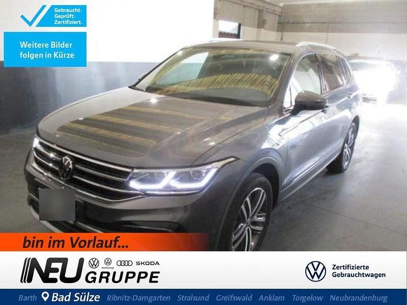 Platinum grey (metallic) Gebraucht 2023 VW Tiguan Allspace Elegance SUV | 41.289 € (Fairer Preis) - Bild 1/4