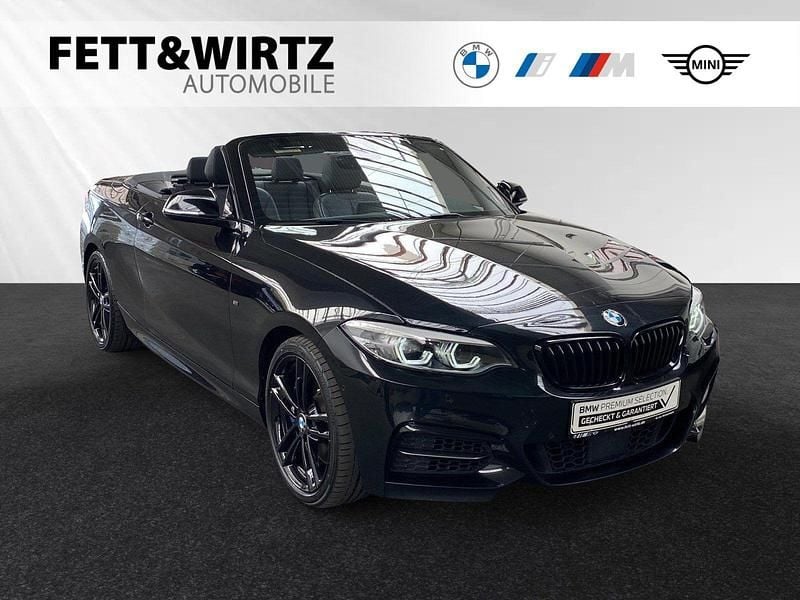 Saphirschwarz metallic Gebraucht 2022 BMW M240 M Sport Cabrio | 36.490 € - Bild 1/3