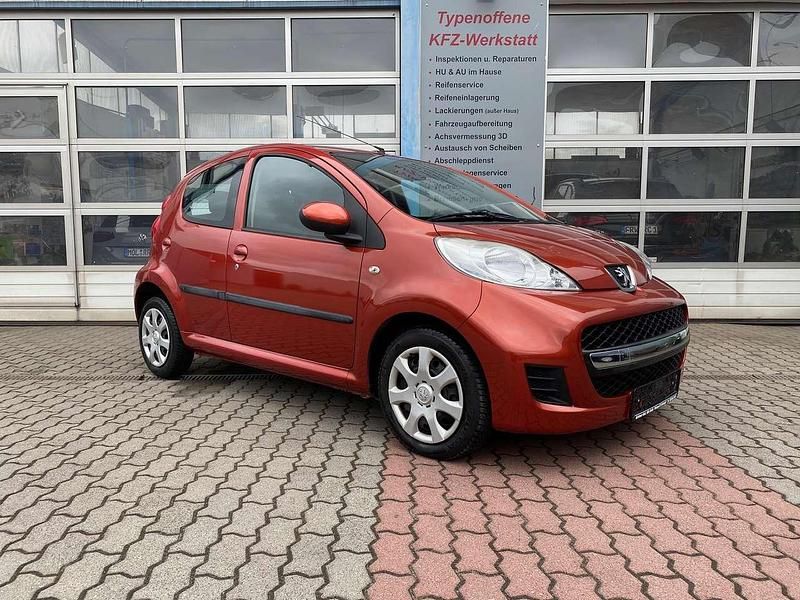 Gebraucht Peugeot 107 68 PS (50 kW) 2009 Orange Kleinwagen
