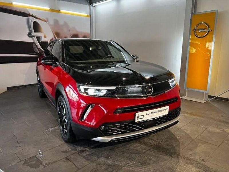 Power rot (metallic) Gebraucht 2021 Opel Mokka-e Ultimate SUV | 16.990 € (Fairer Preis) - Bild 1/4