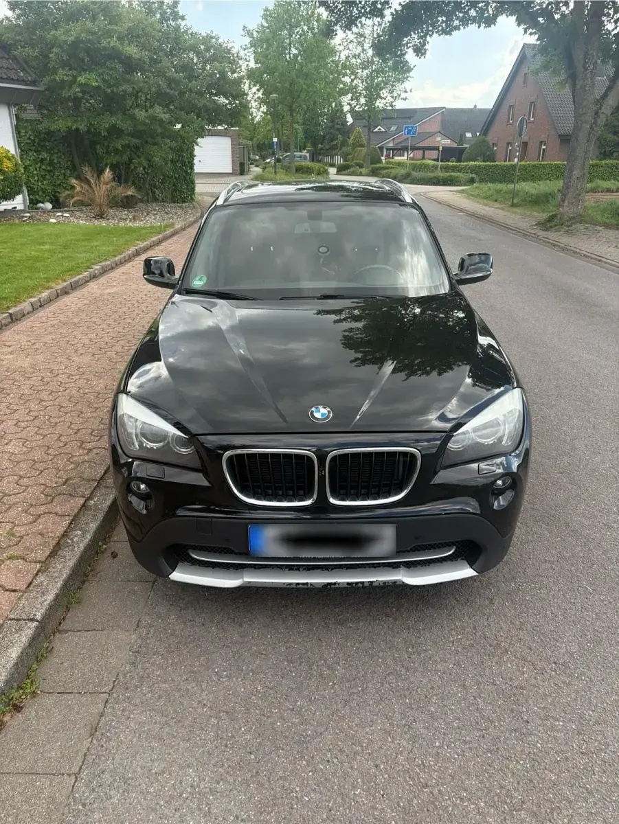Second-hand BMW X1 184 CP (135 kW) 2012 Negru SUV