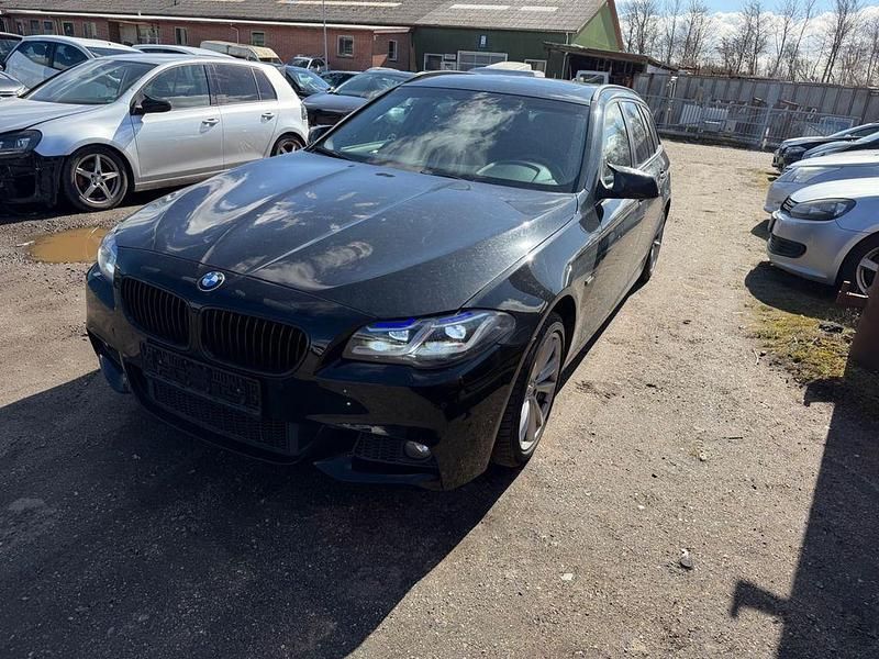 Gebraucht BMW 520 184 PS (135 kW) 2011 Schwarz Kombi
