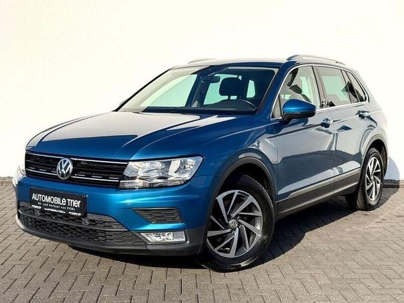 Caribbean blue metallic (metallic) Gebraucht 2017 VW Tiguan Sound SUV | 18.490 € (Guter Preis) - Bild 1/4