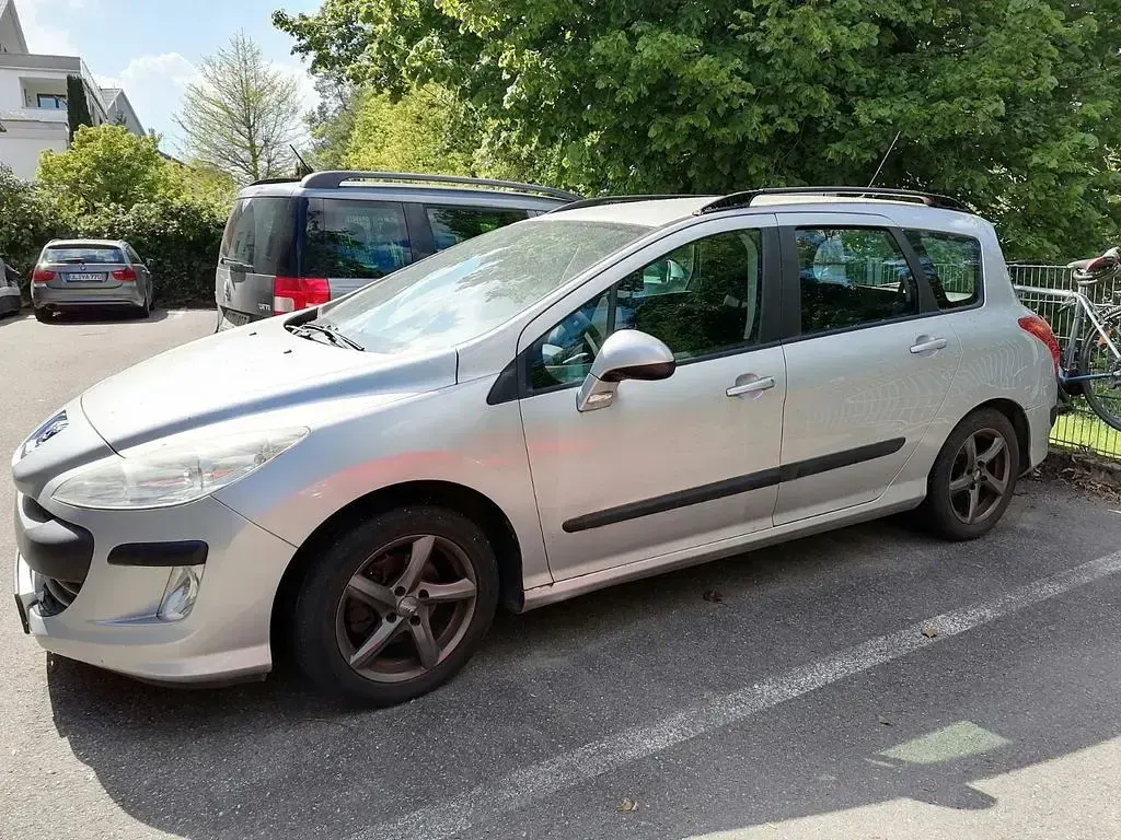 Gebraucht Peugeot 308 113 PS (83 kW) 2011 Silber Kombi