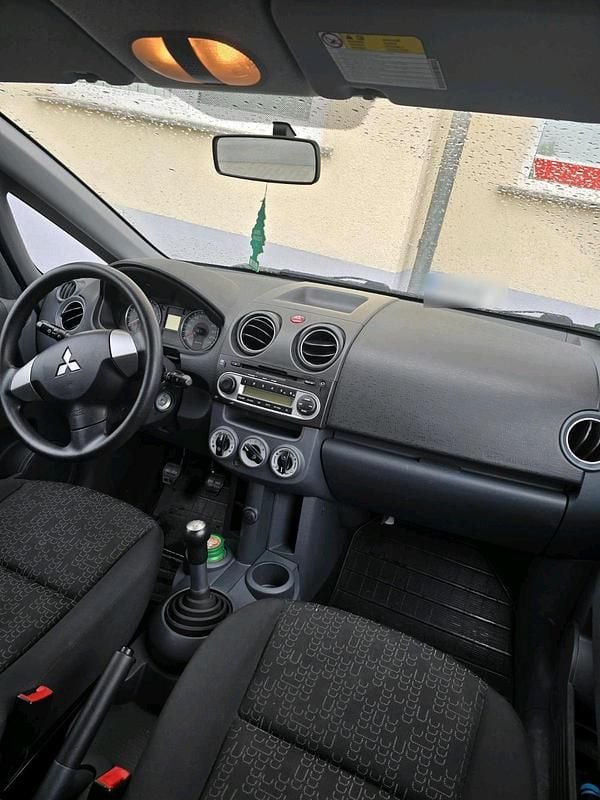 Second-hand Mitsubishi Colt Edition 95 CP (69 kW) 2011 Alb Hatchback