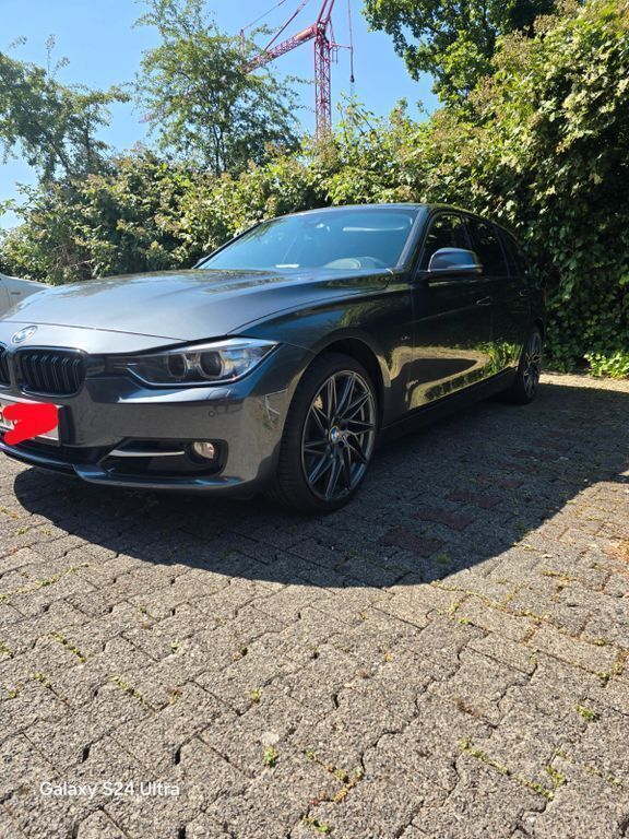 Grau Gebraucht 2014 BMW 330 Sport Line Kombi | 14.900 € (Teuer) - Bild 1/4