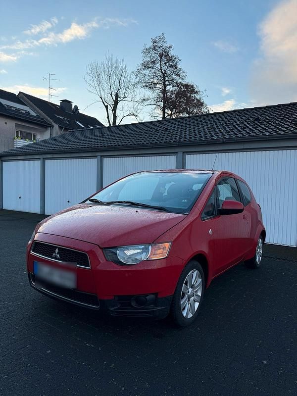 Gebraucht Mitsubishi Colt 95 PS (69 kW) 2011 Rot Kleinwagen