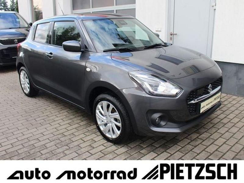Mineral gray Gebraucht 2024 Suzuki Swift Comfort Kleinwagen | 17.990 € (Fairer Preis) - Bild 1/4